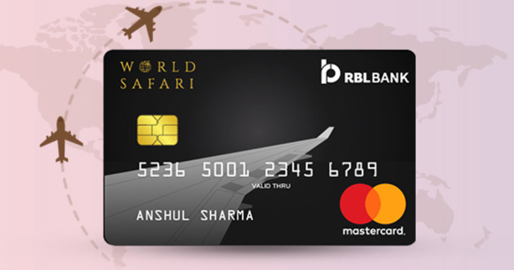 RBL World Safari Credit Card front and back view
Zero forex markup benefit on RBL travel credit card
Using RBL World Safari Credit Card at international airport lounge
Reward points dashboard for RBL credit card user
MakeMyTrip voucher as RBL credit card welcome benefit
Traveler using RBL World Safari Card for international shopping
Comparison chart of RBL Safari Card vs other travel credit cards
Applying for RBL World Safari Credit Card online
RBL credit card complimentary airport lounge access
Infographic showing benefits of RBL World Safari Credit Card
Cardholder redeeming RBL reward points for flight booking
Security features of RBL credit card EMV chip
Screenshot of RBL MyCard app rewards redemption
Travel insurance benefits included with RBL Safari Credit Card